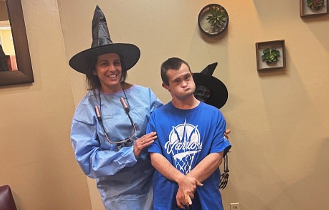 Dr. Sikka with a patient at Sikka Dental